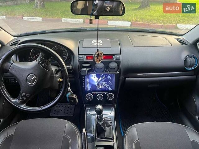 Синий Мазда 6, объемом двигателя 2 л и пробегом 191 тыс. км за 3000 $, фото 11 на Automoto.ua
