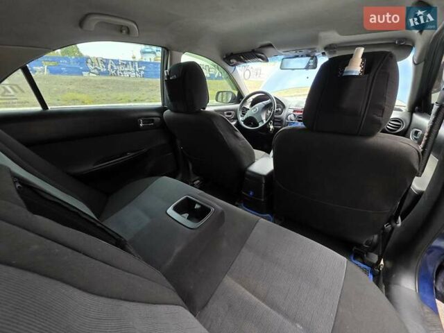 Синій Мазда 6, об'ємом двигуна 2 л та пробігом 307 тис. км за 5500 $, фото 3 на Automoto.ua