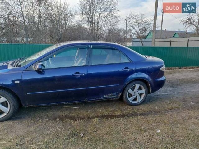 Синий Мазда 6, объемом двигателя 2 л и пробегом 340 тыс. км за 3350 $, фото 5 на Automoto.ua