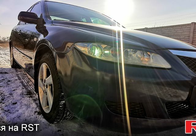 Синій Мазда 6, об'ємом двигуна 2 л та пробігом 270 тис. км за 4200 $, фото 5 на Automoto.ua