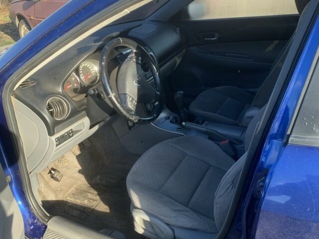 Синий Мазда 6, объемом двигателя 2 л и пробегом 350 тыс. км за 1800 $, фото 5 на Automoto.ua