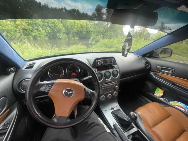 Синій Мазда 6, об'ємом двигуна 2 л та пробігом 321 тис. км за 3600 $, фото 8 на Automoto.ua