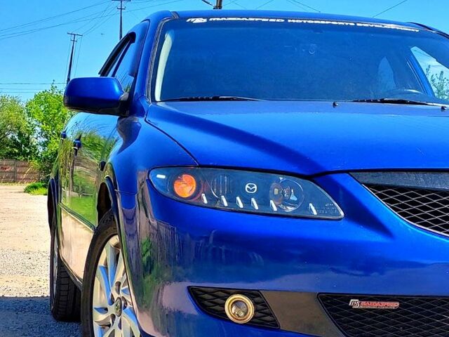 Синий Мазда 6, объемом двигателя 2 л и пробегом 307 тыс. км за 5500 $, фото 4 на Automoto.ua