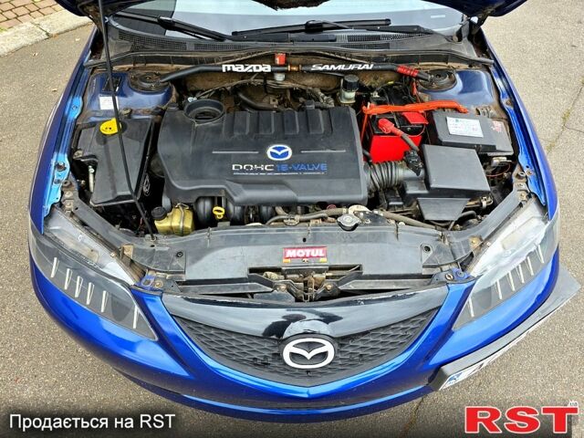 Синий Мазда 6, объемом двигателя 2 л и пробегом 307 тыс. км за 5500 $, фото 6 на Automoto.ua