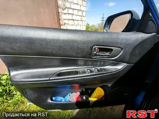Синий Мазда 6, объемом двигателя 2 л и пробегом 270 тыс. км за 4500 $, фото 4 на Automoto.ua