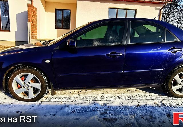 Синий Мазда 6, объемом двигателя 2 л и пробегом 270 тыс. км за 3900 $, фото 2 на Automoto.ua