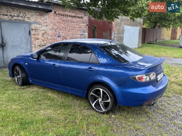Синій Мазда 6, об'ємом двигуна 2 л та пробігом 322 тис. км за 5100 $, фото 49 на Automoto.ua