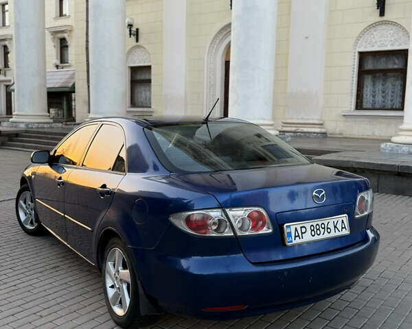 Синий Мазда 6, объемом двигателя 2 л и пробегом 260 тыс. км за 2950 $, фото 2 на Automoto.ua