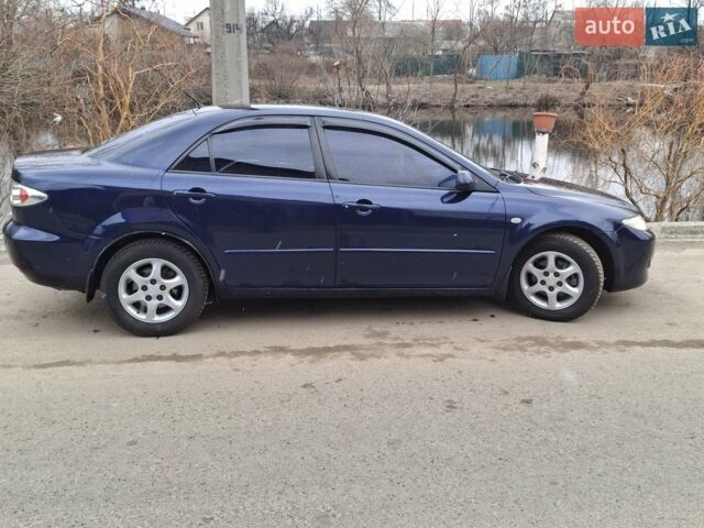 Синій Мазда 6, об'ємом двигуна 1.8 л та пробігом 330 тис. км за 4700 $, фото 5 на Automoto.ua