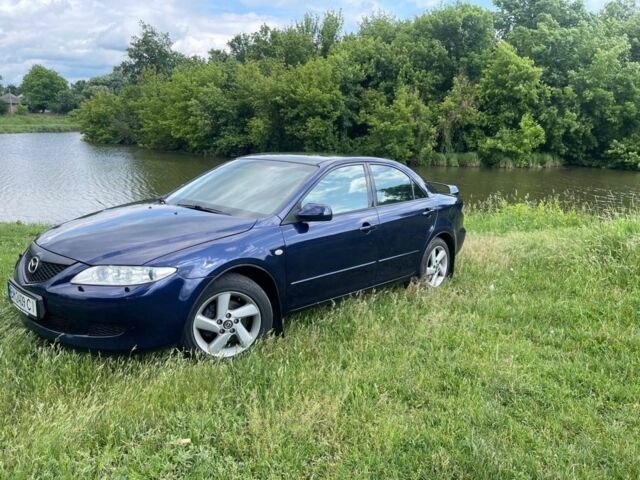 Синий Мазда 6, объемом двигателя 2 л и пробегом 329 тыс. км за 3800 $, фото 2 на Automoto.ua