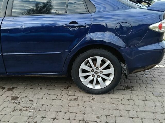 Синий Мазда 6, объемом двигателя 2 л и пробегом 305 тыс. км за 4720 $, фото 6 на Automoto.ua