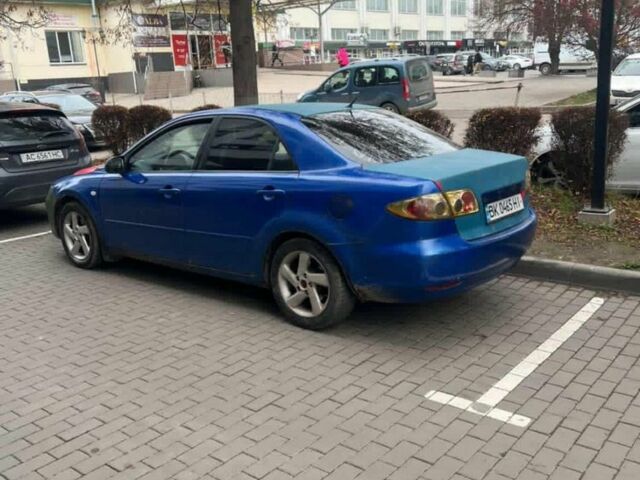 Синий Мазда 6, объемом двигателя 2 л и пробегом 450 тыс. км за 2000 $, фото 2 на Automoto.ua