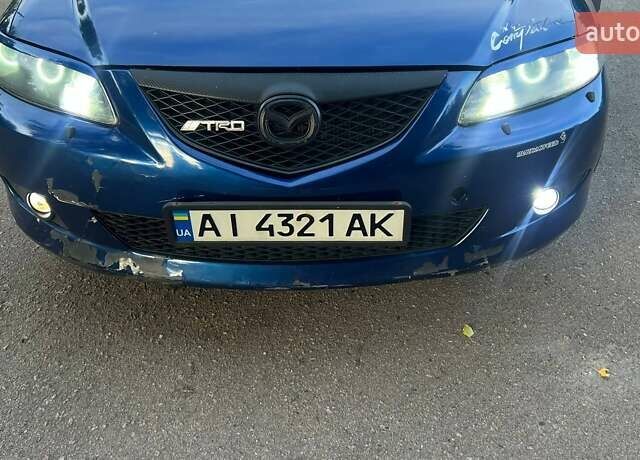 Синий Мазда 6, объемом двигателя 2 л и пробегом 191 тыс. км за 3000 $, фото 13 на Automoto.ua