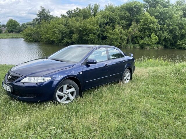 Синій Мазда 6, об'ємом двигуна 2 л та пробігом 321 тис. км за 3600 $, фото 4 на Automoto.ua
