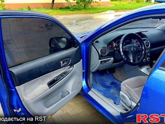 Синий Мазда 6, объемом двигателя 1.8 л и пробегом 231 тыс. км за 6200 $, фото 6 на Automoto.ua