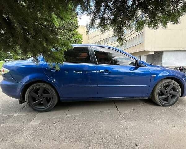 Синий Мазда 6, объемом двигателя 2 л и пробегом 250 тыс. км за 3999 $, фото 7 на Automoto.ua