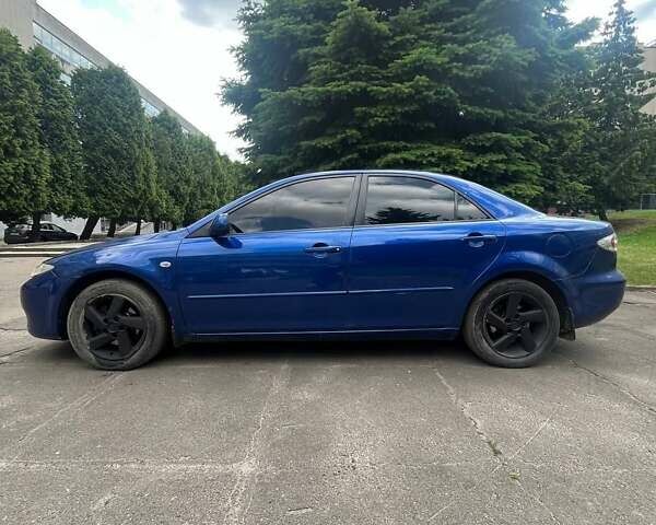 Синий Мазда 6, объемом двигателя 2 л и пробегом 250 тыс. км за 3999 $, фото 3 на Automoto.ua