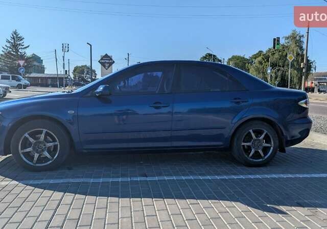 Синий Мазда 6, объемом двигателя 1.8 л и пробегом 323 тыс. км за 3900 $, фото 9 на Automoto.ua