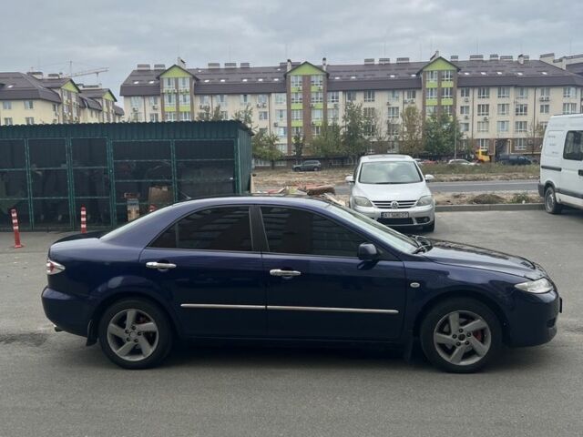 Синий Мазда 6, объемом двигателя 2 л и пробегом 309 тыс. км за 3800 $, фото 2 на Automoto.ua