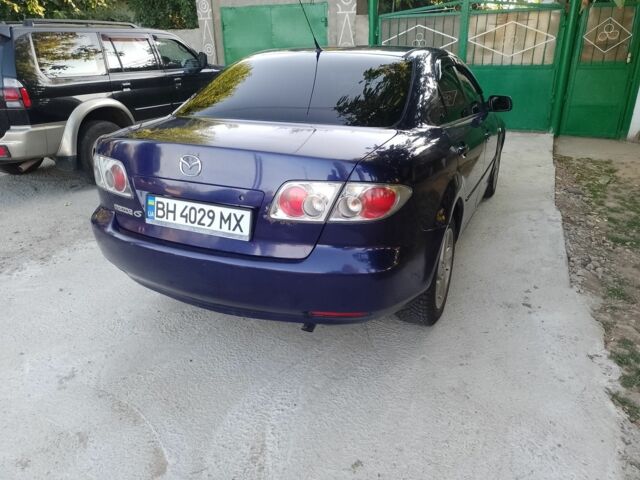 Синій Мазда 6, об'ємом двигуна 2 л та пробігом 350 тис. км за 3500 $, фото 4 на Automoto.ua