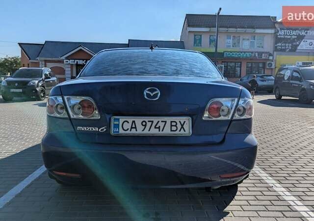 Синий Мазда 6, объемом двигателя 1.8 л и пробегом 323 тыс. км за 3900 $, фото 5 на Automoto.ua