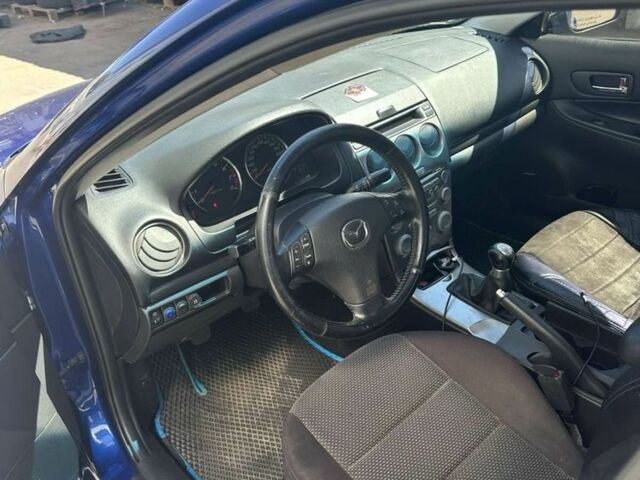 Синий Мазда 6, объемом двигателя 2 л и пробегом 217 тыс. км за 4600 $, фото 7 на Automoto.ua