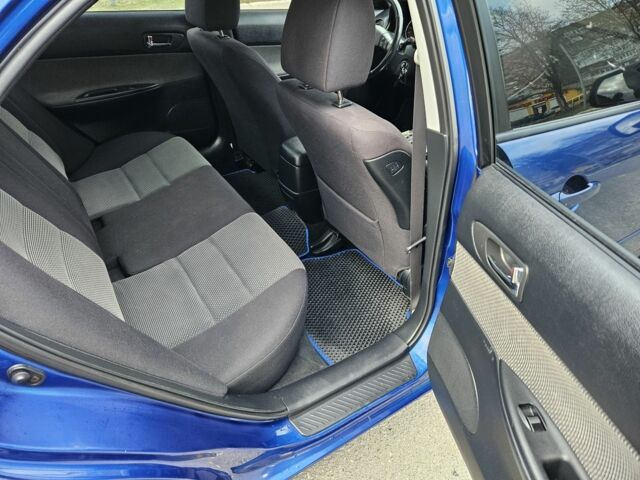 Синій Мазда 6, об'ємом двигуна 2 л та пробігом 90 тис. км за 5500 $, фото 5 на Automoto.ua