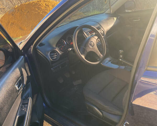 Синий Мазда 6, объемом двигателя 1.8 л и пробегом 321 тыс. км за 3950 $, фото 2 на Automoto.ua