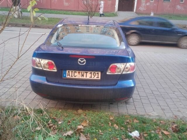 Синий Мазда 6, объемом двигателя 2 л и пробегом 300 тыс. км за 900 $, фото 1 на Automoto.ua