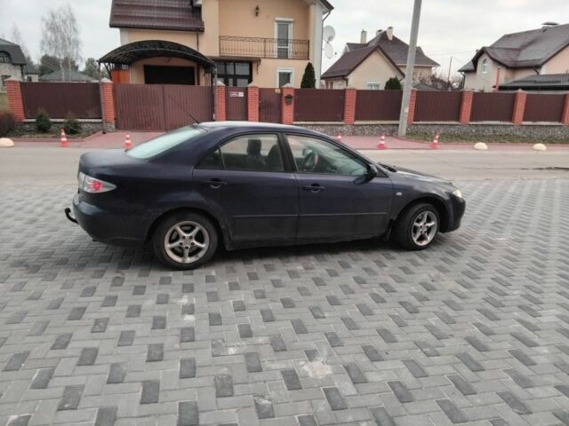 Синий Мазда 6, объемом двигателя 2 л и пробегом 340 тыс. км за 1850 $, фото 3 на Automoto.ua
