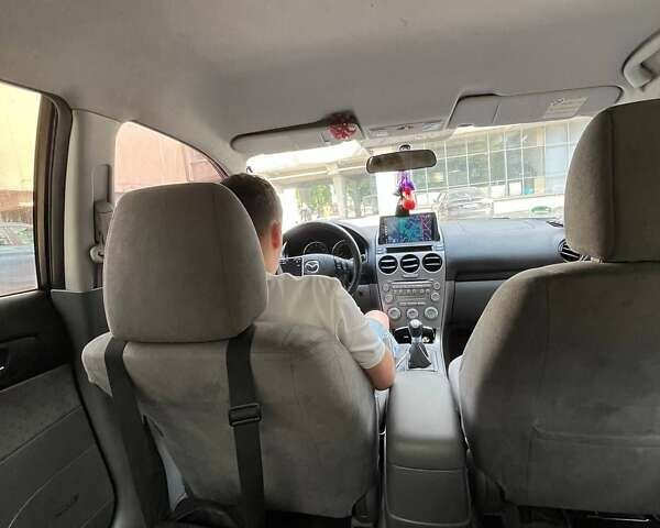 Синий Мазда 6, объемом двигателя 2 л и пробегом 250 тыс. км за 3999 $, фото 2 на Automoto.ua