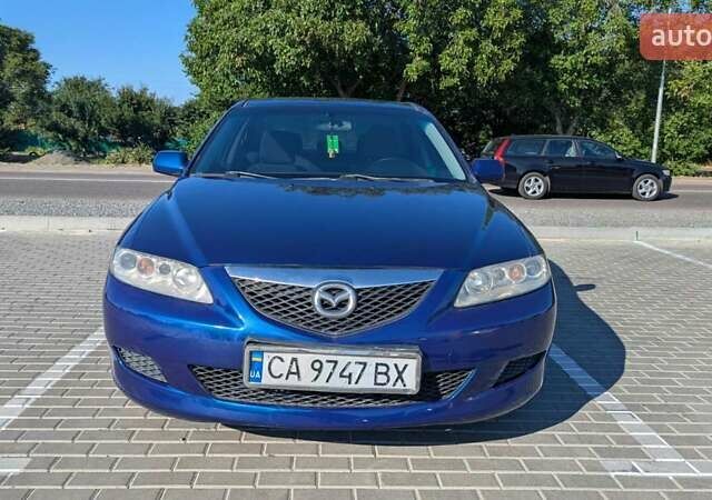 Синий Мазда 6, объемом двигателя 1.8 л и пробегом 323 тыс. км за 3900 $, фото 13 на Automoto.ua