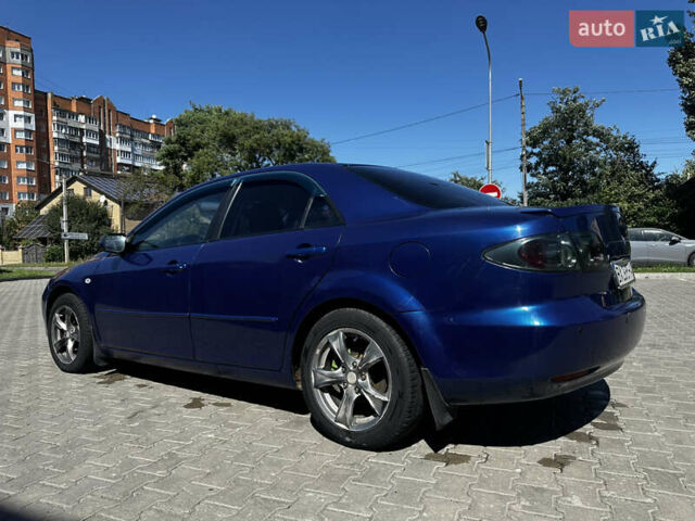 Синій Мазда 6, об'ємом двигуна 2 л та пробігом 220 тис. км за 4700 $, фото 36 на Automoto.ua