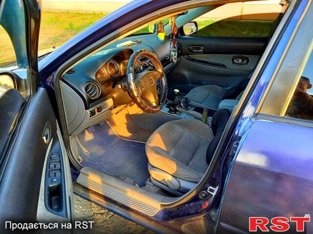 Синий Мазда 6, объемом двигателя 1.8 л и пробегом 240 тыс. км за 3800 $, фото 5 на Automoto.ua