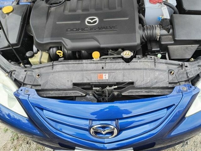 Синий Мазда 6, объемом двигателя 2 л и пробегом 170 тыс. км за 5000 $, фото 2 на Automoto.ua