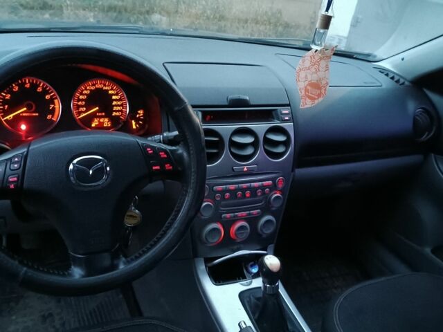Синій Мазда 6, об'ємом двигуна 1.8 л та пробігом 320 тис. км за 3100 $, фото 5 на Automoto.ua
