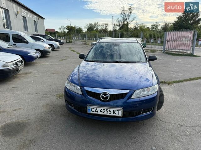 Синий Мазда 6, объемом двигателя 2 л и пробегом 320 тыс. км за 3150 $, фото 1 на Automoto.ua