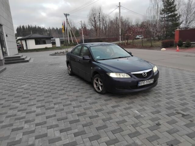 Синий Мазда 6, объемом двигателя 2 л и пробегом 340 тыс. км за 1850 $, фото 2 на Automoto.ua