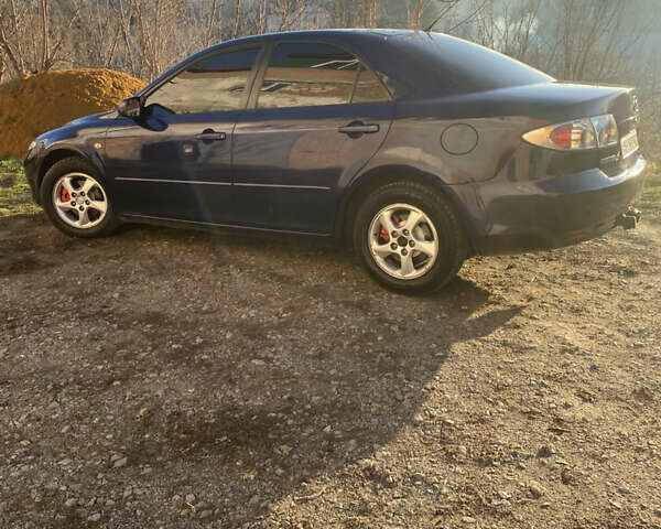 Синий Мазда 6, объемом двигателя 1.8 л и пробегом 321 тыс. км за 3950 $, фото 1 на Automoto.ua