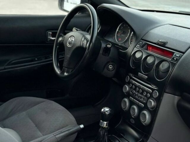Синий Мазда 6, объемом двигателя 2 л и пробегом 280 тыс. км за 2750 $, фото 5 на Automoto.ua