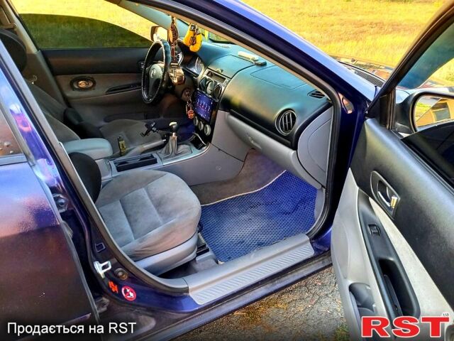 Синий Мазда 6, объемом двигателя 1.8 л и пробегом 240 тыс. км за 3800 $, фото 2 на Automoto.ua