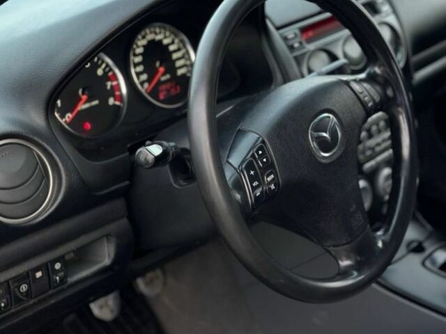 Синий Мазда 6, объемом двигателя 2 л и пробегом 280 тыс. км за 2750 $, фото 11 на Automoto.ua