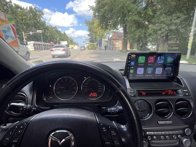Синий Мазда 6, объемом двигателя 2 л и пробегом 309 тыс. км за 3800 $, фото 8 на Automoto.ua
