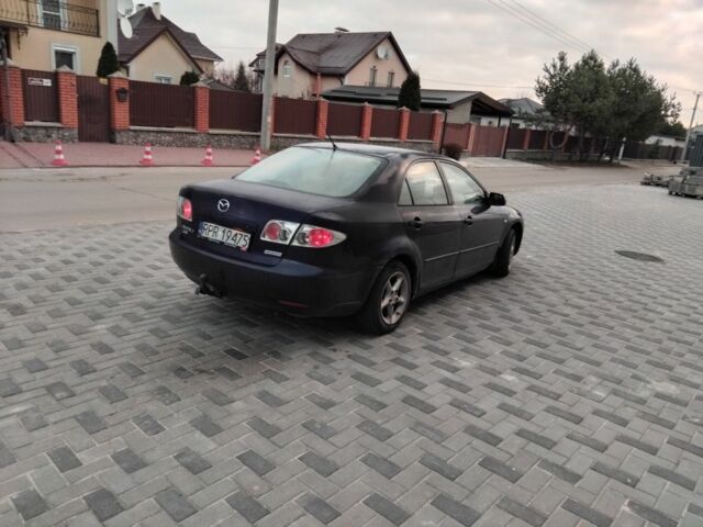 Синий Мазда 6, объемом двигателя 2 л и пробегом 340 тыс. км за 1850 $, фото 4 на Automoto.ua