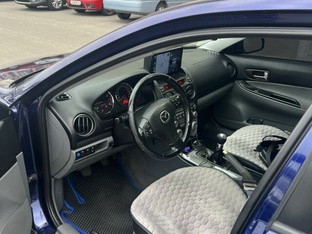 Синий Мазда 6, объемом двигателя 2 л и пробегом 309 тыс. км за 3800 $, фото 4 на Automoto.ua
