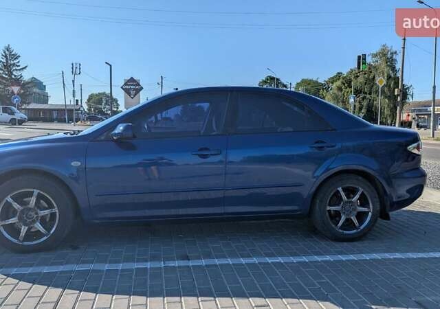 Синий Мазда 6, объемом двигателя 1.8 л и пробегом 323 тыс. км за 3900 $, фото 4 на Automoto.ua