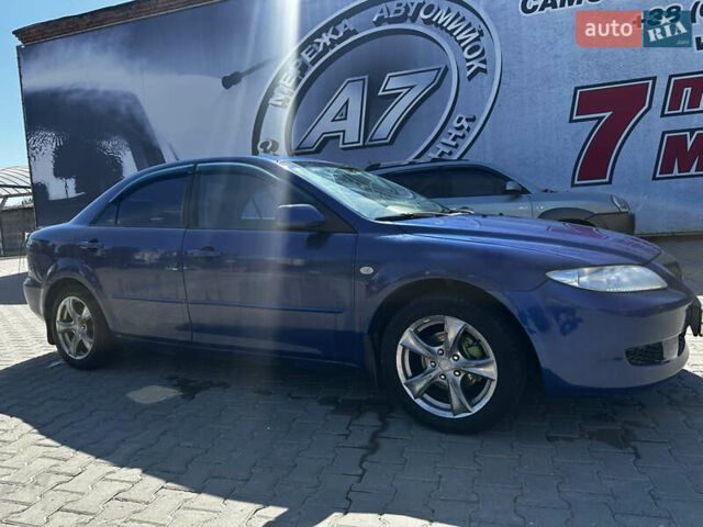 Синій Мазда 6, об'ємом двигуна 2 л та пробігом 220 тис. км за 4700 $, фото 16 на Automoto.ua