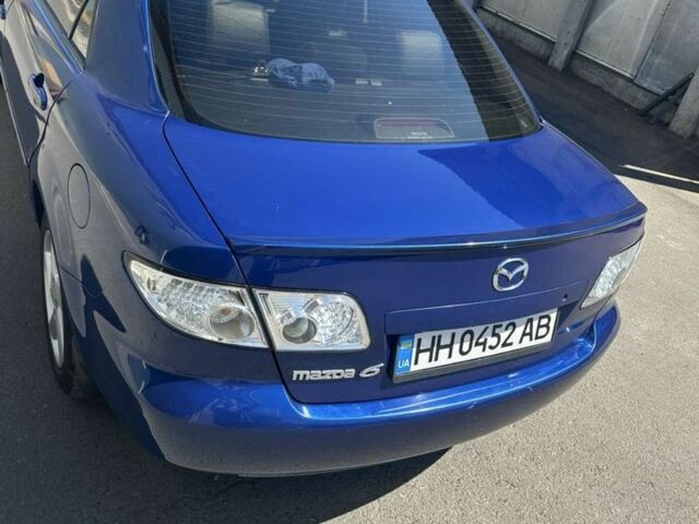 Синий Мазда 6, объемом двигателя 2 л и пробегом 217 тыс. км за 4600 $, фото 3 на Automoto.ua