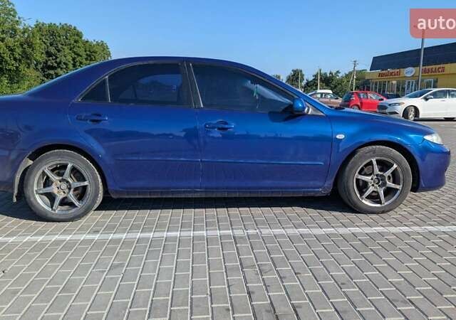 Синий Мазда 6, объемом двигателя 1.8 л и пробегом 323 тыс. км за 3900 $, фото 10 на Automoto.ua