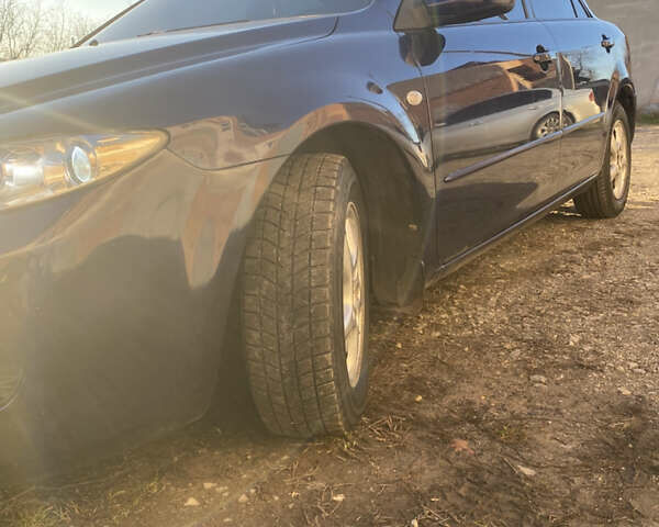 Синий Мазда 6, объемом двигателя 1.8 л и пробегом 321 тыс. км за 3950 $, фото 3 на Automoto.ua